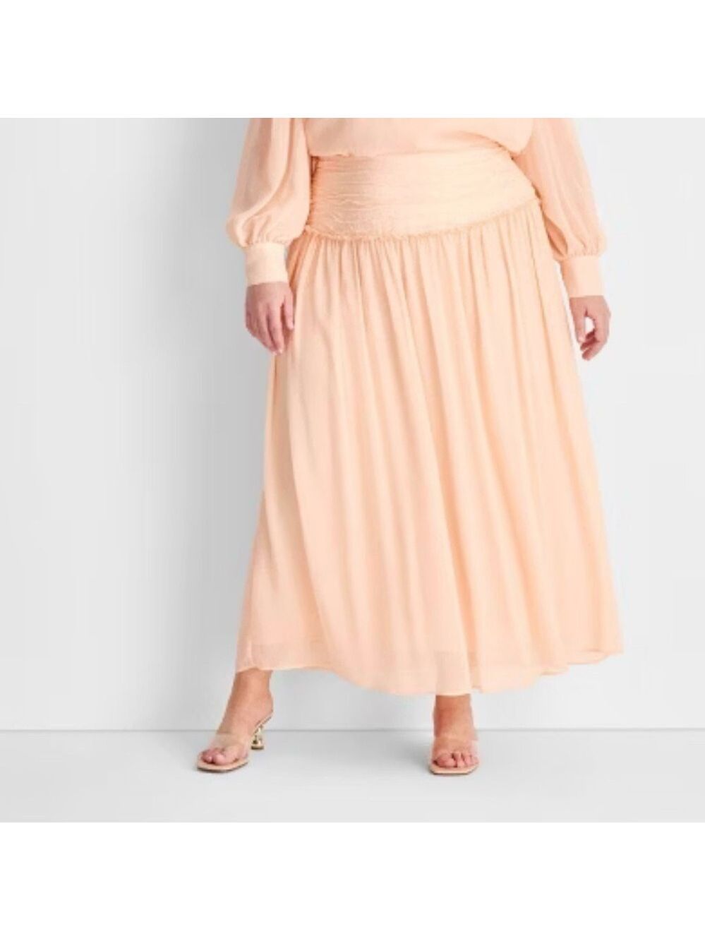 Pink Ruched Maxi Skirt by future collection. This is fitting for a beach